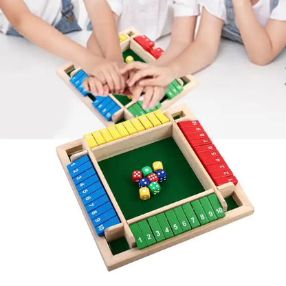 group of children enjoying a classic 4-player shut the box dice game for indoor family fun