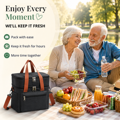 Senior couple enjoying a picnic by a lake with a cooler bag, food, and drinks.