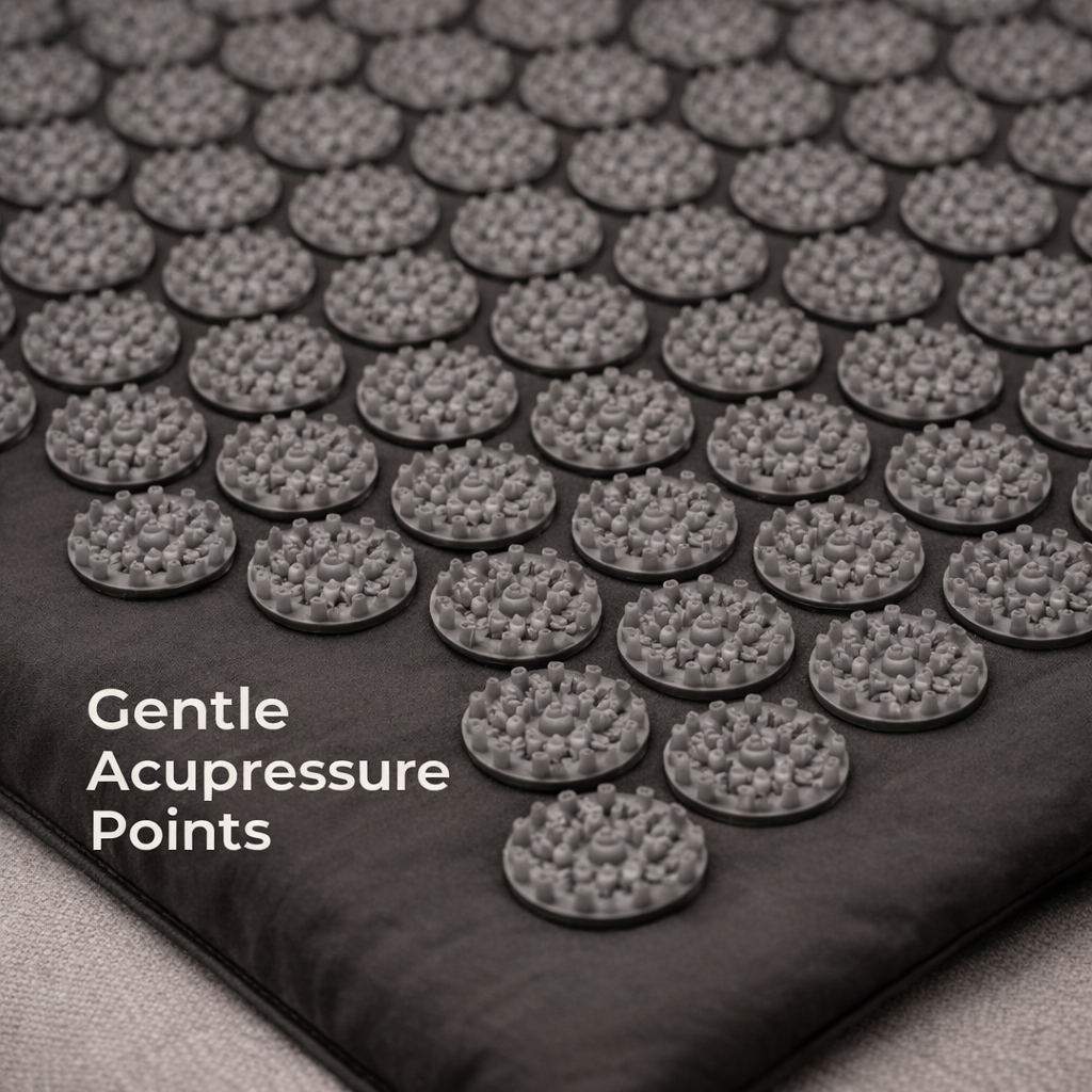 close-up view of gentle acupressure points on a black therapy mat for stimulating blood flow