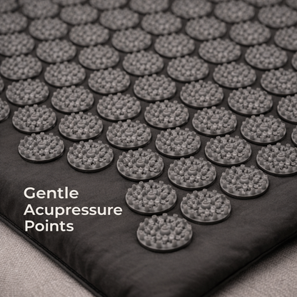 close-up view of gentle acupressure points on a black therapy mat for stimulating blood flow