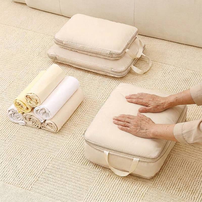 demonstration of rolling clothes and using compression packing cubes to save space in luggage