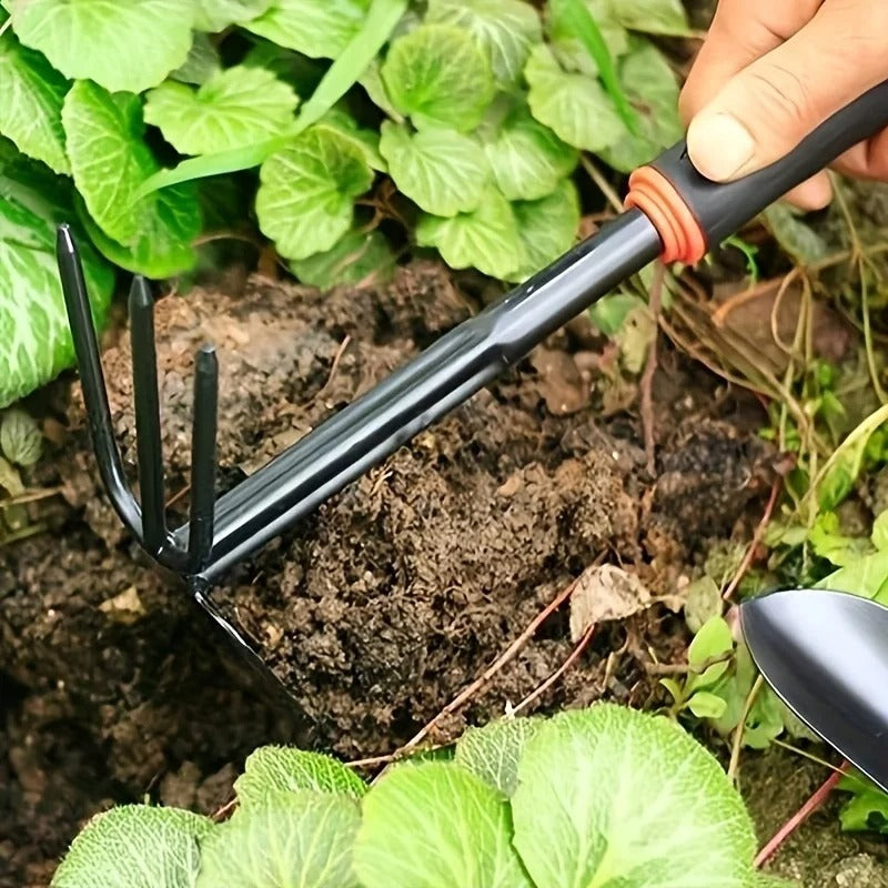 hand cultivator tool loosening soil for healthy plant growth