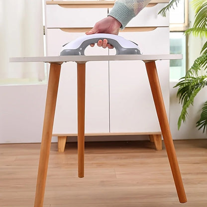 demonstration of the strong suction power of the grab bar lifting a wooden table
