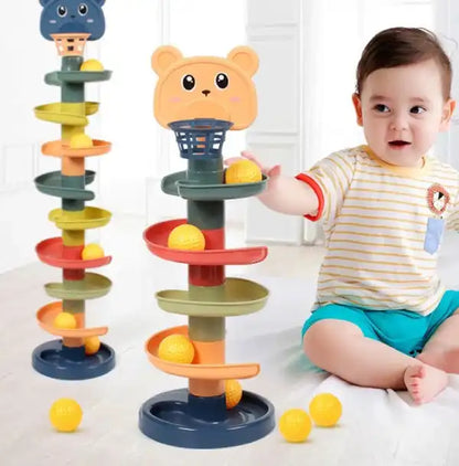 happy baby sitting on the floor playing with a Montessori rolling ball toy to develop fine motor skills