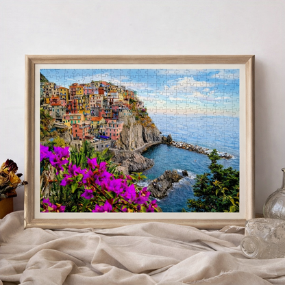 Framed 500-piece Cinque Terre scenic jigsaw puzzle displayed as home wall art.