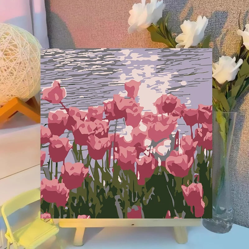 cool pink sunset landscape paint by numbers canvas displayed on easel