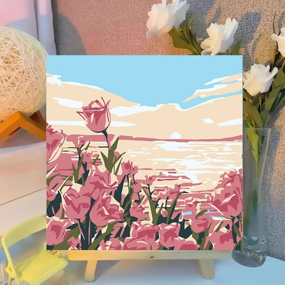 warm sunset beach landscape paint by numbers artwork on tabletop easel