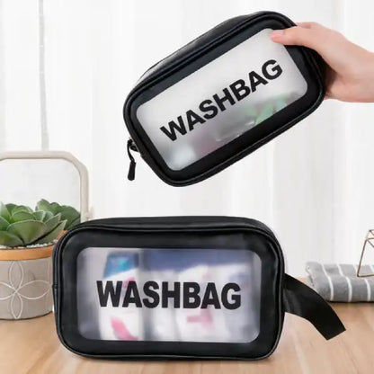 handheld view of the medium-sized clear travel pouch bag for quick identification of contents