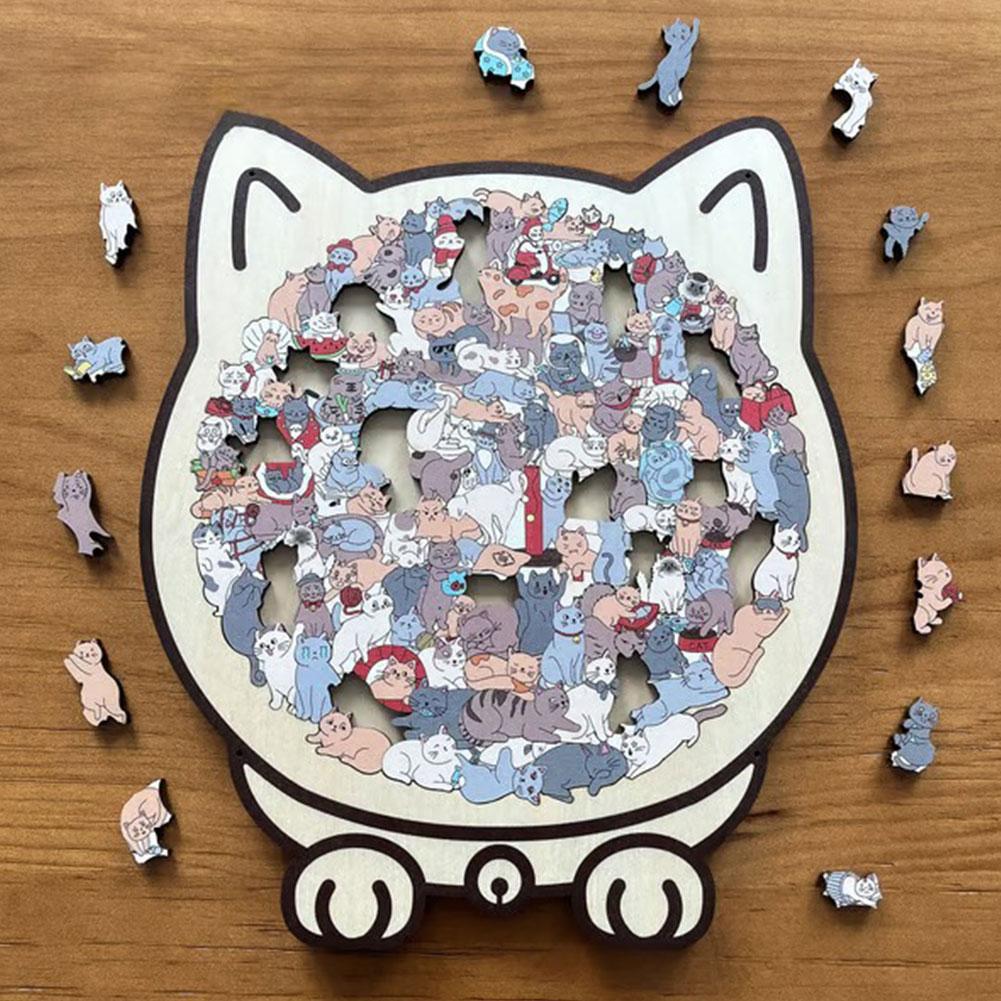 Cat-shaped puzzle with small cat pieces on a wooden surface