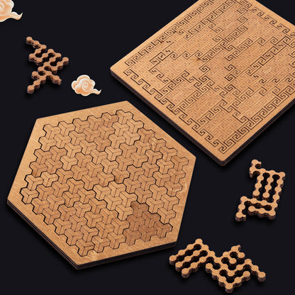 Hexagonal wooden brain teaser base with several loose interlocking puzzle pieces.